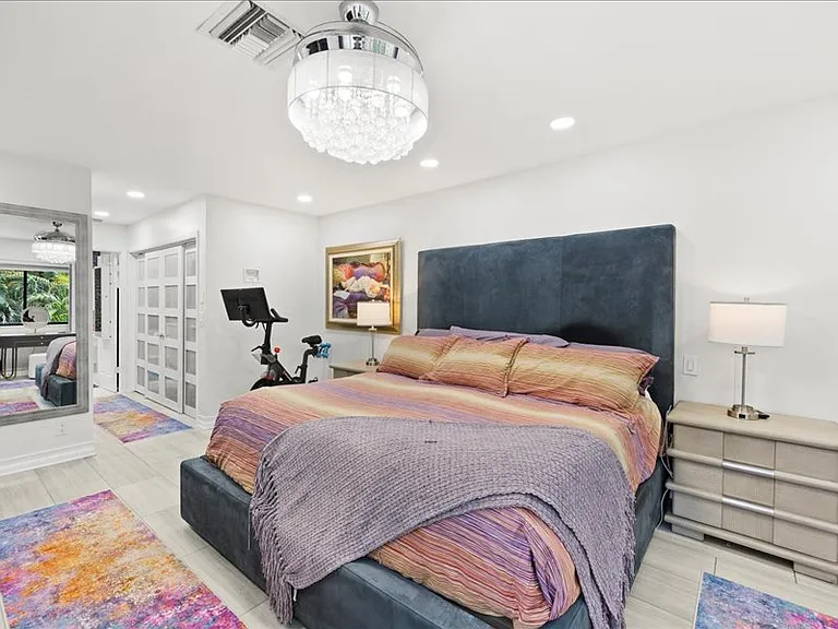 Separate switches for recessed lighting for reading on either side of bed.