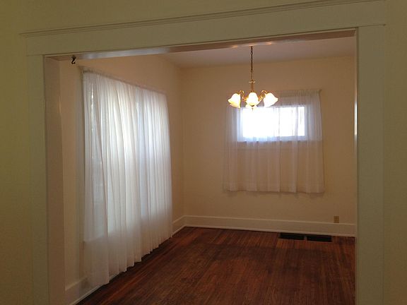 Living room looking into dining room.