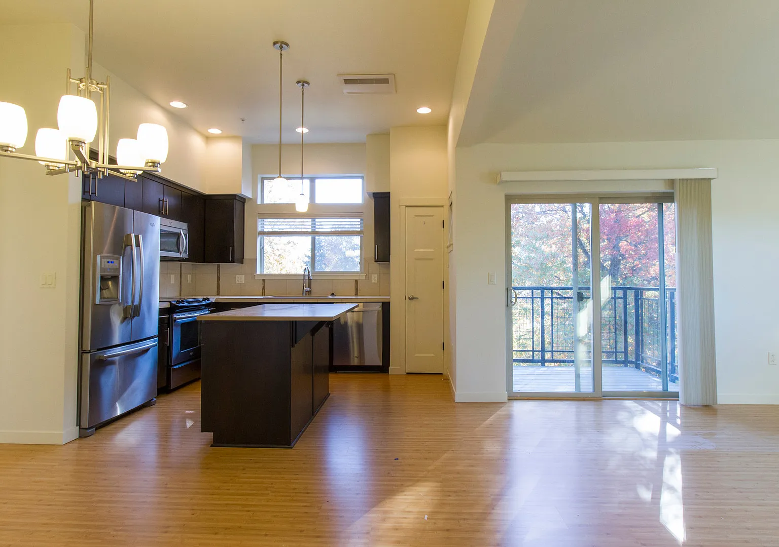 Incredible Top Floor Unit with Balcony, Community Pool, and Laundry in Unit — Photo 4
