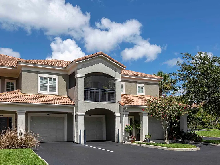 Building exterior with convenient parking and attached garages