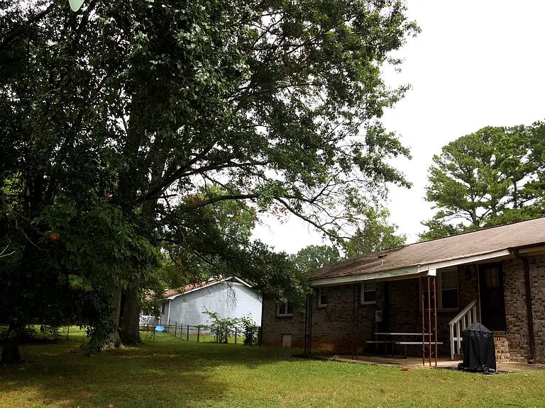 Backyard covered patio with picnic area