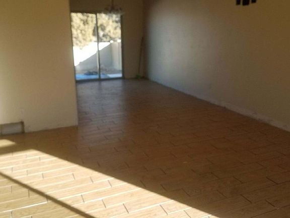living room and kitchen new tile floor