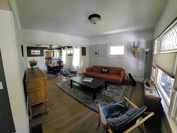 downstairs living and dining area, available furnished as shown