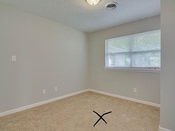 Room that now has hard flooring.