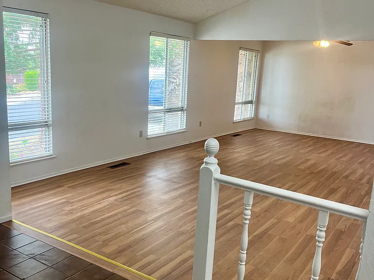 Entryway, hallway, living, and dinning rooms.