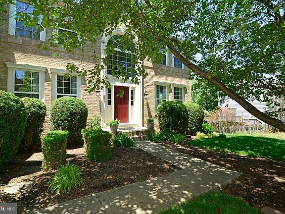 Brick-Front Colonial with 6-bedrooms