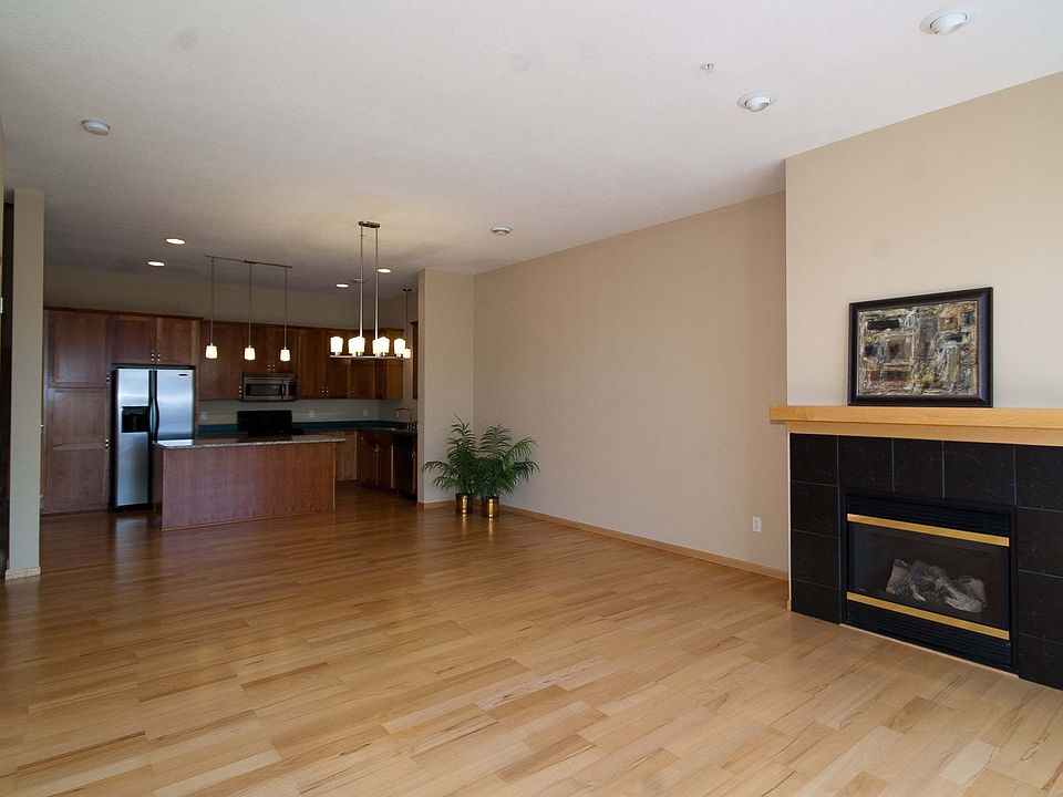 Wide open living/dining area with hardwood floors