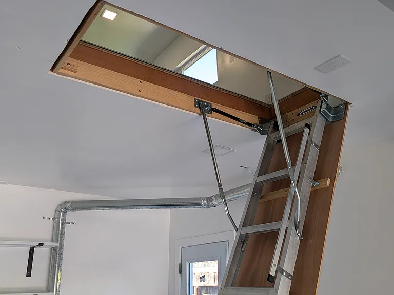Access to the attic from the garage.