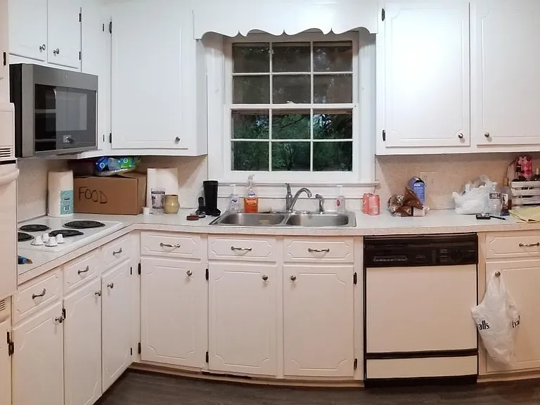 Kitchen (Laundry Room to right and large Living Room to Left)