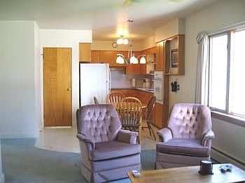 Open floor plan with kitchen opening to family room