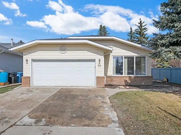 51 SE Woodmont Rd SW, Calgary, AB T2W 4L6