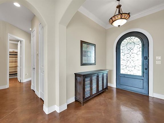 View of the Entry and Hall way to two of the bedrooms and Hall Bath
