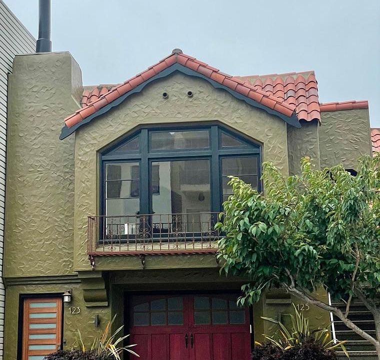 FRONT OF FRESHLY PAINTED HOUSE, 125 CORBETT TOP LEVEL MAIN ENTRY TO THE RIGHT SIDE WITH STAIRS