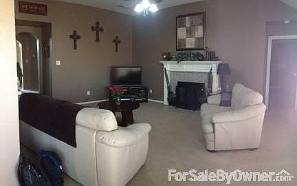 Family Living Room
						:
						Gas Fire place, with logs