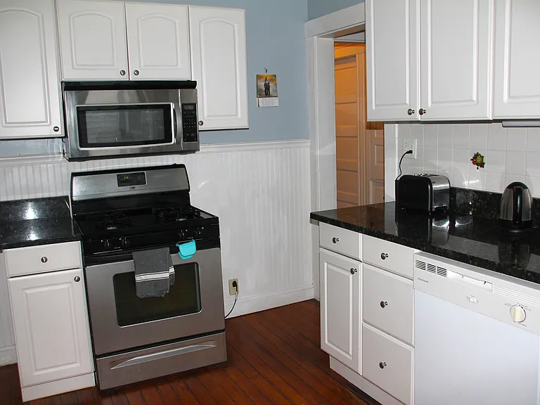 Freshly painted kitchen includes dishwasher/appliances, crockery, cutlery, linens, glasses & plenty of storage space, heated & cooled with a heat-pump mini-split
