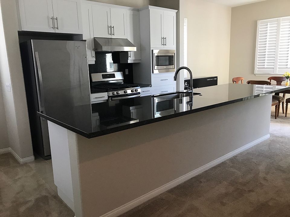 Open Floor Plan with Large Granite Kitchen Island