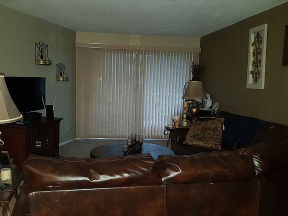 Living Room facing balcony.