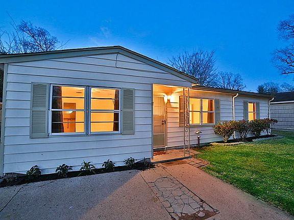 Attractive landscaping has been newly added to this marvelous front yard.