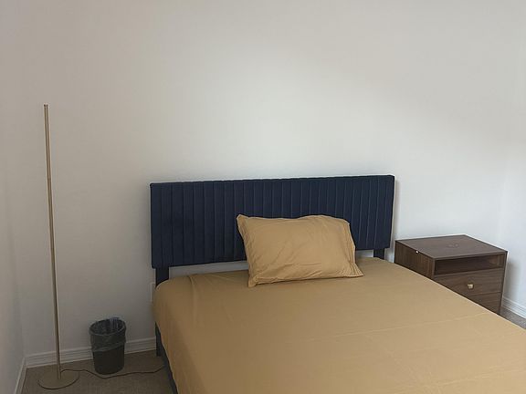 Queen Bed with a wireless charging night stand