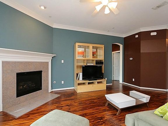 Family Room: new wood flooring, speaker surround sound with volume controls