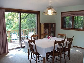 Dining room with a sliding glass door to a 20x10 deck.