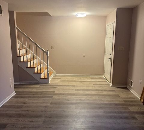 Front door to living area and stairs