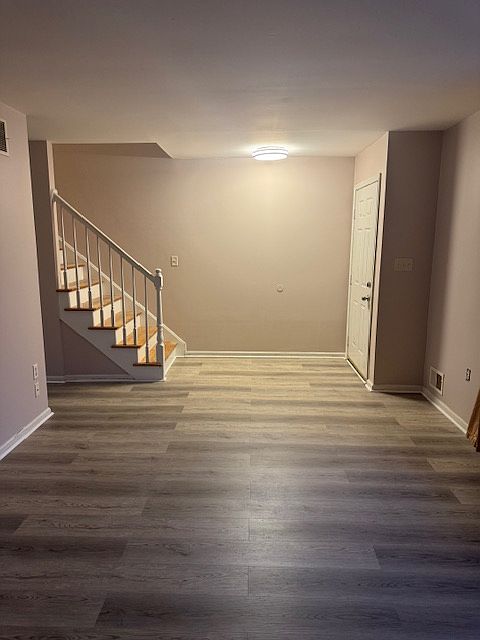 Front door to living area and stairs
