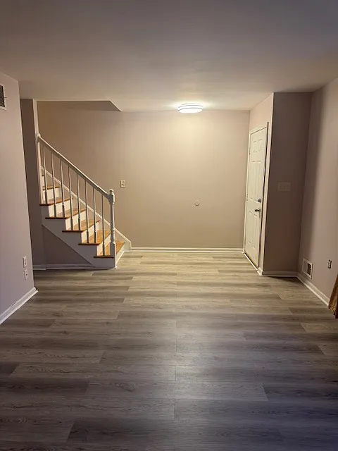 Front door to living area and stairs