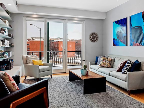 Not only does this unit have a huge 900 square foot terrace, but it also has a front balcony, access