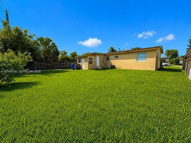 7720 Raleigh St — Photo 17