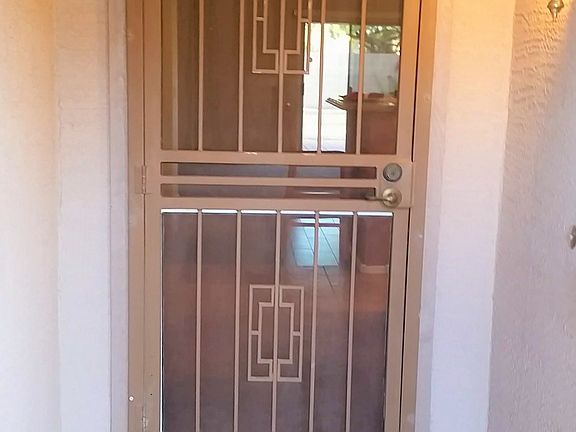 Covered entry, security door