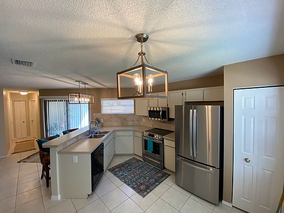 Open Plan - Natural Light, Sliding Glass Door to Covered Lanai