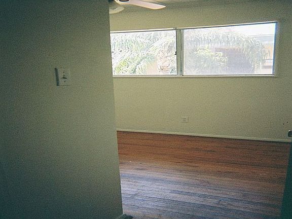Bedroom two also offers a sunny, courtyard window.
