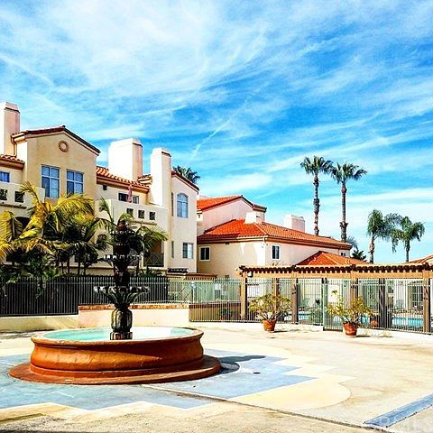 Mediterranean Style Courtyard with a fountain