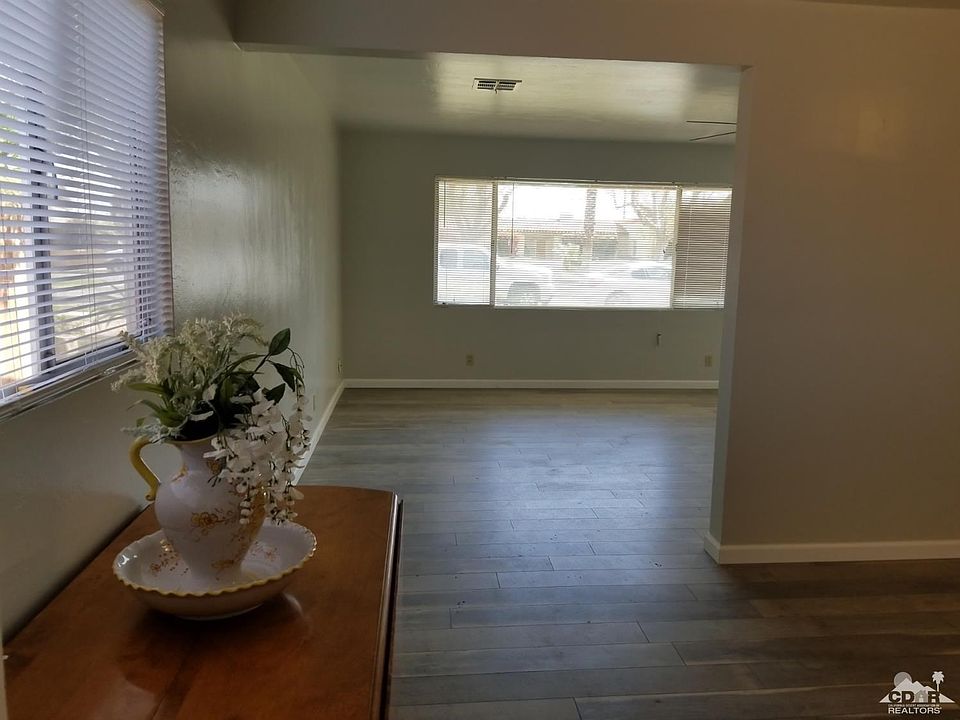 Dining Room/Living room. Fresh paint, floors, windows and just ready!!