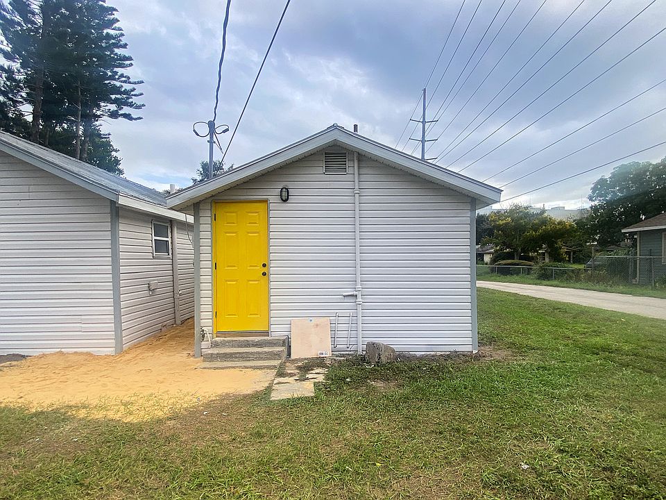 Rear entrance with open parking