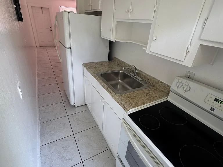 2451 NW 13th Ct — Photo 1