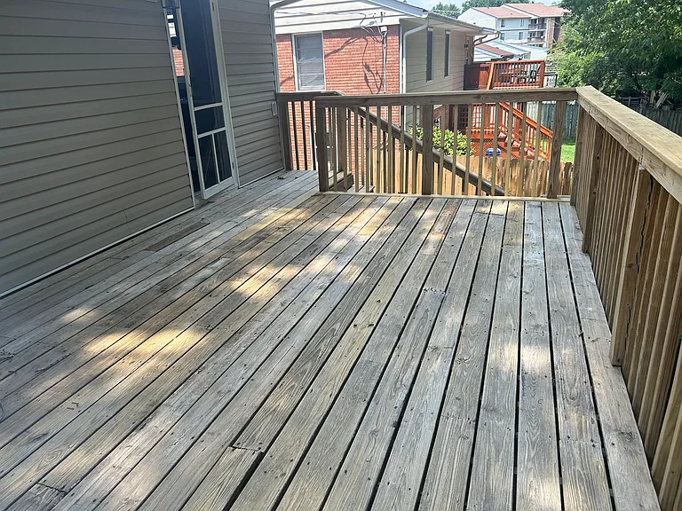 Large, heavily-shaded back deck