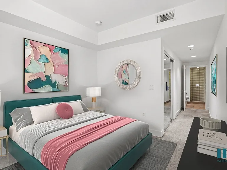Bedroom with Mirrored Closet and Bathroom