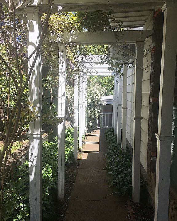Covered walkway to backyard
