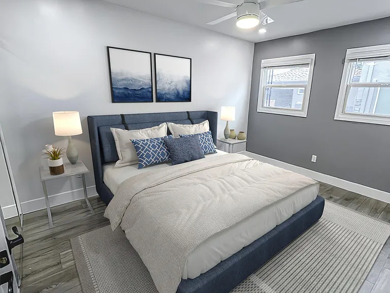 3rd bedroom with multiple windows and large closet