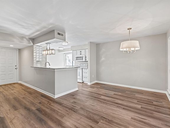 Open plan - entrance to unit, kitchen and dining area