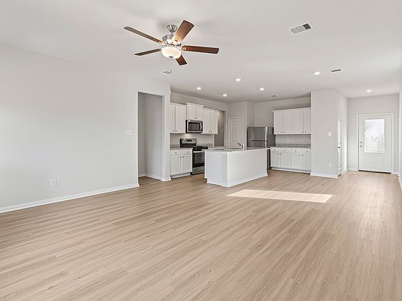 The foyers welcomes you in to a open floor plan