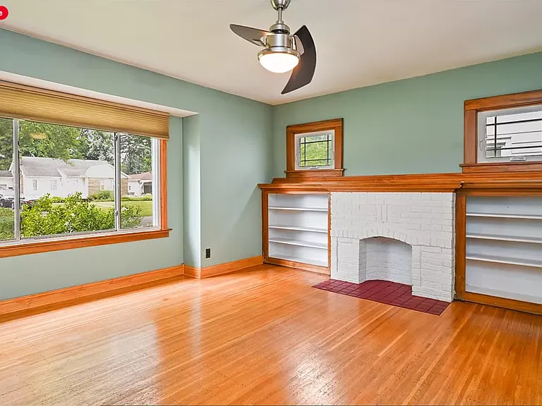 Living Room with built-ins ( and non-working fireplace)