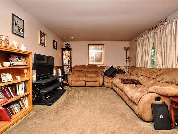 The large family room is cozy and inviting.