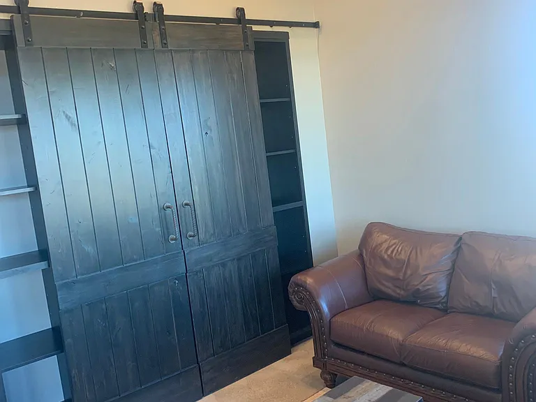 Custom entertainment and shelving built in cabinets.