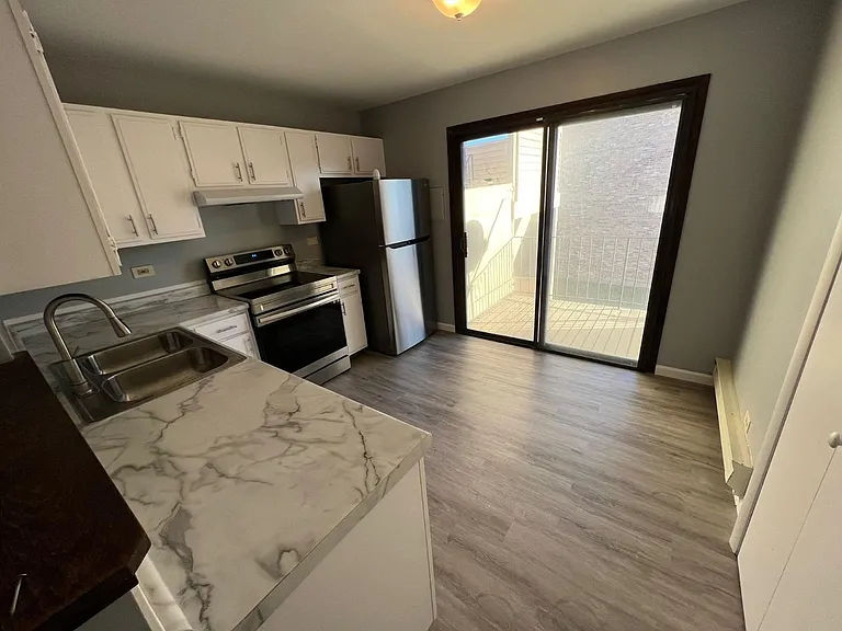 Kitchen with new countertops and flooring