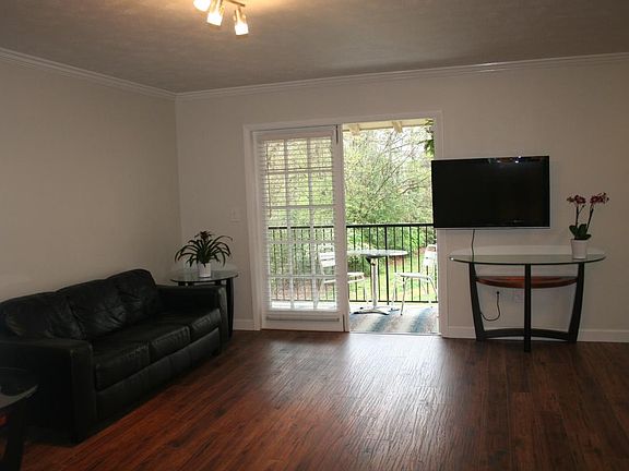 Living room with wall mounted TV