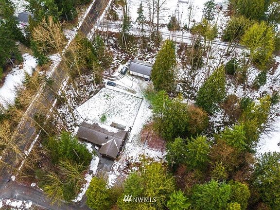 The roads represent the boundaries to the property. Note the extra driveway for the shop!