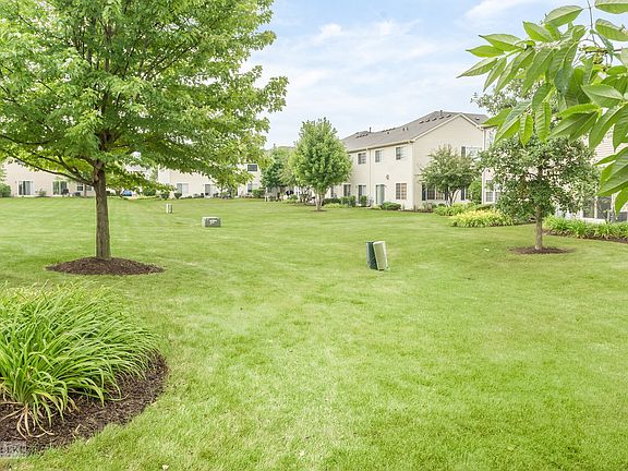 View of shared open space/backyard~Lawn maintenance included!